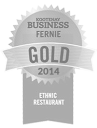 A winner's ribbon in grey of the gold award for best ethnic restaurant of 2014 in the Kootenays, BC for Tandoor & Grill, the onsite restaurant at the Stanford Fernie Resort.