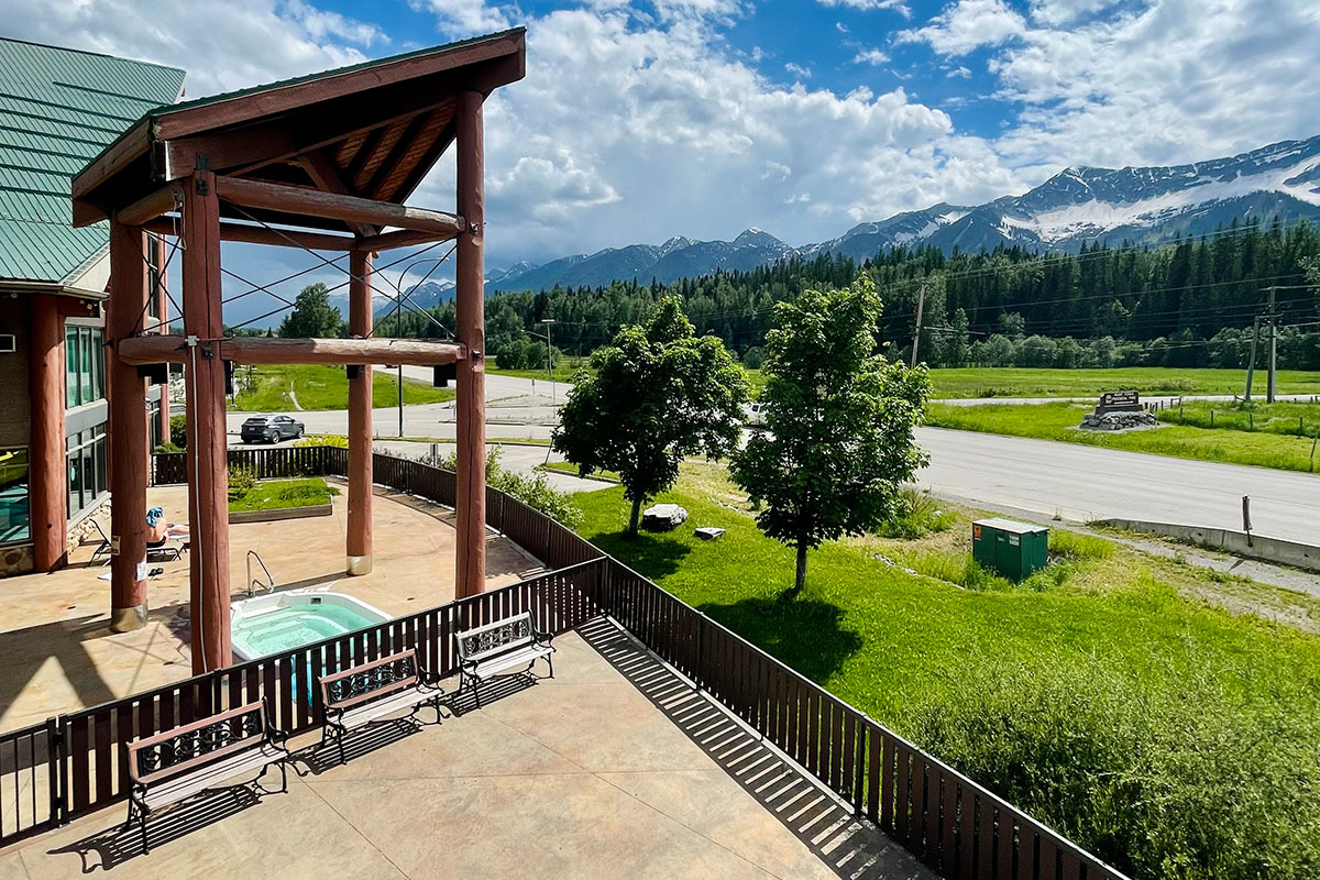 The Stanford Fernie Resort has unique architectural features such as a multi-gable roof structure with ground to roof windows set against the backdrop of the Rocky Mountains in BC.